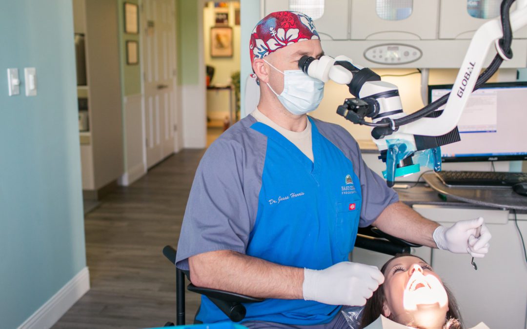 Dr. Jesse Harris provides pain-free root canal treatment to his patient.